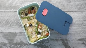 Download Reusable lunch container with a salad inside for free