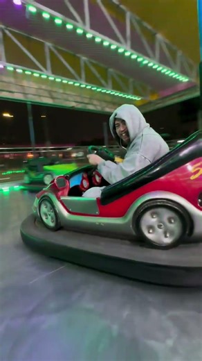 Whindersson in the neon bumper cars