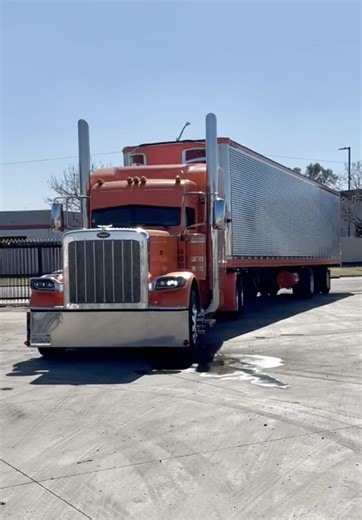 Custom Peterbilt 389 with 53' Spread Trailer