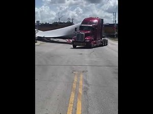 Train blasts through truck carrying wind turbine propeller through Luling - KTSA