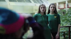 Backstage photography. Photoshoot. Photographer photographs the model.