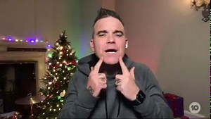 28K views · 313 reactions | Robbie Williams caught up with Lisa Wilkinson to talk about what lockdown has taught him about fatherhood, and how his new album flicks the middle finger straight in the face of COVID-19. Robbie Williams’ new single ‘Can’t Stop Christmas’ from his album ‘The Christmas Present’ is out now. | The Project | Facebook