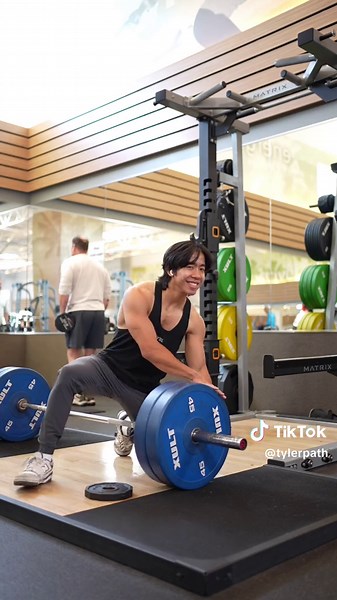 Lets work smarter, not harder. The easiest way to rack and unrack a barbell on the ground is by taking a 5lb plate and rolling the plate on top. #fyp #fitness #gym #bodybuilding