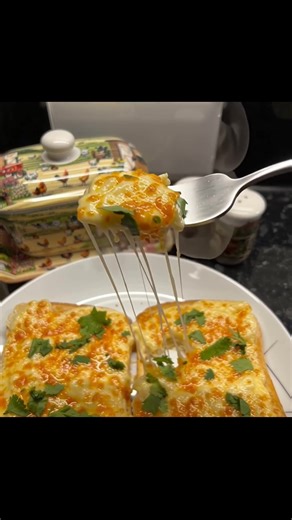 Chilli Cheese on Toast Ingredients: • 4 slices of bread • 1 cup grated cheese (cheddar or mozzarella) • 1-2 green chillies, finely chopped • 1 tablespoon butter • Salt to taste • Pepper to taste • Fresh herbs (optional, for garnish) Directions: 1. Preheat your grill or broiler. 2. Lightly toast the bread slices on one side. 3. In a bowl, mix together the grated cheese, chopped chillies, salt, and pepper. 4. Spread the butter on the untoasted side of the bread slices. 5. Generously top the butter