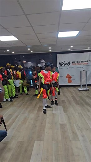 WATCH || A masquerade band takes over the stage and excites the audience at the Orange Economy: From Creatives to Commerce - Mashramani Cocktail Mixer at the World Trade Center. Credit: News Room/February 18, 2026 #newsroomguyana #masquerade #culturegy #creativesgy | News Room