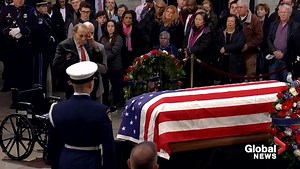 Bob Dole salutes the casket of George H.W. Bush in emotional moment