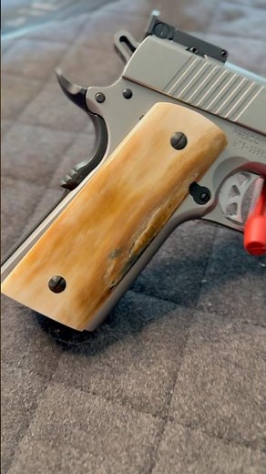 Legendary 1911 Showcases Extinct Mammoth Ivory