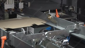 Machines for the production of paper containers or packaging, for further use in the food industry. Stock Video