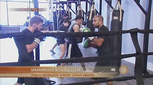 Ji gets a boxing lesson at Unanimous Boxing Gym