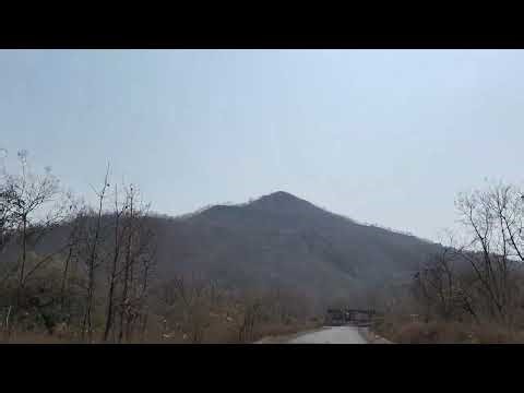 Mandleshwar travel with dangerous turn ,slope road in Ghats,dense forests region, High mountains