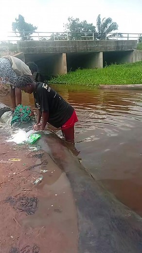 Traditional Laundry Methods: Strong Women Washing Clothes