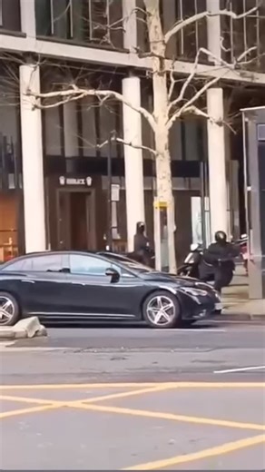 Im just real on Instagram: "Rolex store in Knightsbridge West London, robbed around 11am in broad daylight yesterday, men on motorcycles ride into store and steal Rolex watches, one man seen waving a sword or large knife at security to warn them off, members of the public watching in shock #rolex #london #robbery #crime #viral"