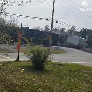 461K views · 858 shares | Bystander video captures the alarming moment a freight train slammed into a tractor-trailer that was stuck on the tracks in Acworth, Georgia. The truck driver was thankfully able to jump out before the collision. | ABC News | Facebook