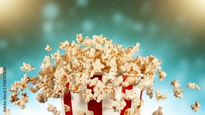 Super Slow Motion of Exploding popcorn from Bucket. Composite Shot. Isolated on Colored Background. Studio Shot of Flying Food. Filmed on High Speed Cinema Camera, 1000fps. Speed Ramp Effect.