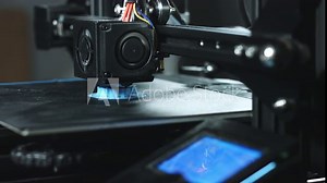 3D plastic printer during work in a factory three dimensional printing.