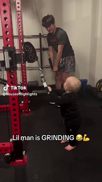 Little Muscle Man Lifts Weights with Humor