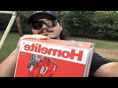 Homelite 26cc 2 Cycle curved shaft String trimmer unbox and 1st start