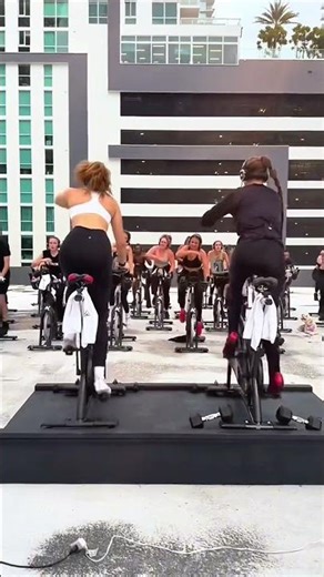 Here’s one for your workout motivation: a rooftop spinning class with a view! 🤩 #workout #spinning