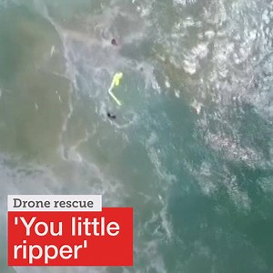 The moment a Surf Life Saving NSW drone rescues two swimmers off Lennox Head. Full story: http://bit.ly/2DMC6S4 | SBS News