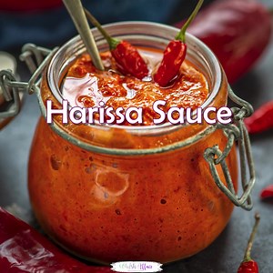 Harissa sauce is a North African & Middle Eastern spicy red sauce that is made using simple ingredients in under 20 minutes. It is vibrant red in color and adds smokiness and heat to whatever it is added to. For detailed recipe, click on the link below - https://www.whiskaffair.com/moroccan-harissa-sauce/ | Whiskaffair