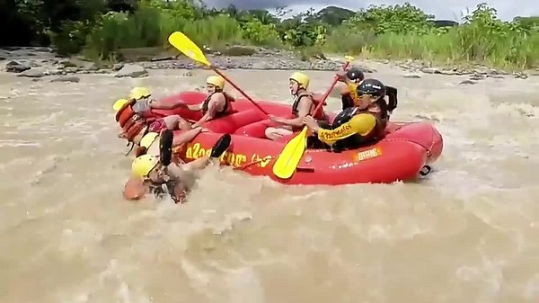Water Rafts Collide in the Middle of Rapids