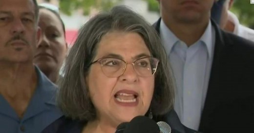 210 people are "working on the mound" at building collapse site