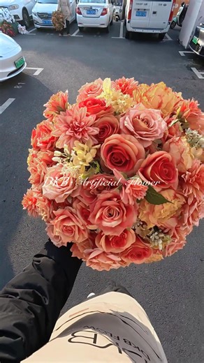 10K views · 92 reactions | FB1079李The highly saturated warm orange floral centerpiece is so beautiful it makes your heart racePassionate yet gentle, a radiant romance that the camera chases after✨ www.dkbflower.com #dkbflower #dkbcrafts #orangeflower #flowercenterpiece #weddingcenterpiece #usawedding #outdoorwedding | Artificial flowers（Fengqiu zhaogang silk flower factory） | Facebook
