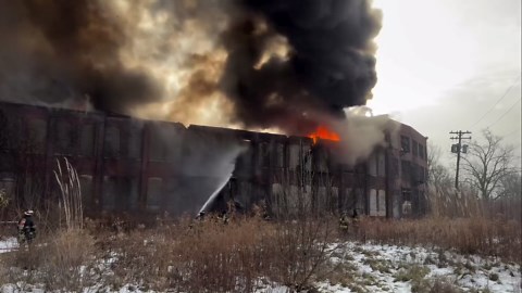 Firefights scramble to put out raging fire in vacant building on Indy’s near east side