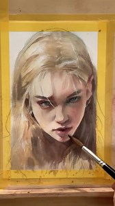 A captivating watercolor portrait that masterfully balances softness and intensity. The artist’s expressive brushwork brings depth to the subject’s piercing gaze, while delicate washes of color capture the play of light and shadow. The raw energy in this piece makes it truly mesmerizing Painting by @lauralinstudio #watercolor #watercolors #watercolorpainting #watercolorart | Watercolor Masters