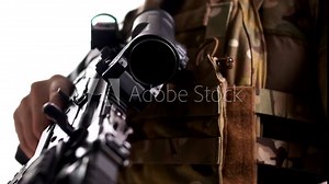 Military Specialist with rifle with a collimator