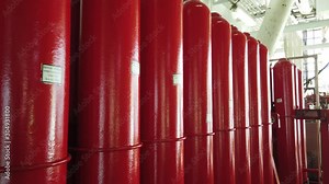 Accumulator bottles at accumulator unit (Koomey) surface BOP control system in oil drilling rig