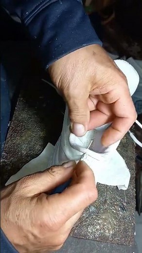 how to sew with a hand-held awl