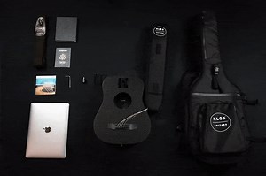 The ultimate weatherproof travel guitar on the market, paired with a sleek innovative gig bag that converts down to a backpack. Never worry about traveling with your guitar again. | KLŌS Guitars
