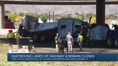 Eastbound US 6 closure continues after semi goes over the bridge on I-70 near Golden
