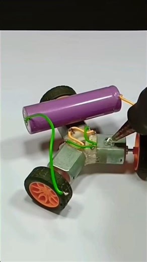 How to make a mini super fast bey blade car using by DC motors switch #battery #eloctronic #shorts