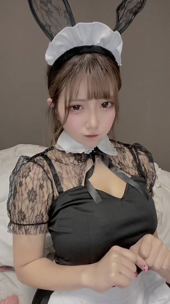 Charming Maid Outfit Showcase in a Cozy Bedroom