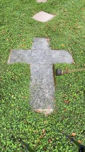 Gravestone Cleaning Techniques in a Cemetery Setting