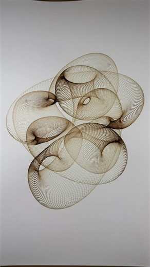 James Nolan Gandy on Instagram: "Drawing with the pyrography tool. I have to speed up the process when the ellipses are small or it will burn through the paper. #mechanicaldrawing #pyrography #ratio #analog #drawingmachine #embossing #experimental"