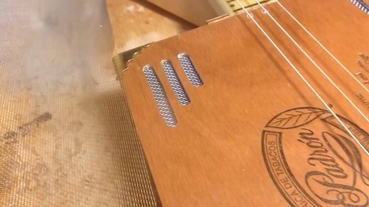 Give your cigar box guitars a dobro look with this simple screened-in sound hole idea by Shane Speal. | Cigar Box Nation