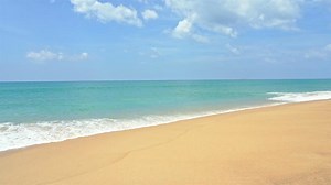 Download Beautiful tropical beach sea ocean with with white cloud blue sky for free