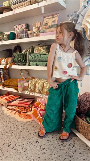 WITH LOVE on Instagram: "H O L I D A Y S 🩷 School holidays in full swing — juggling the shop, the dreams, and this little girl by my side 🤍 Some days are loud, busy and a little messy… but they’re also full of magic. Lainey Blossom couldn’t wait to unpack our new Freckles the Label pieces and help dress the window today — her smile shining brighter than anything else ✨ These are the moments I’ll always hold onto. Mum life. Shop life. Heart full 🤍 P.S. Lainey’s Bella & Lace pants are part of o