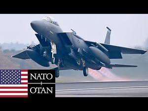 US Air Force, NATO. Powerful afterburner takeoff of F-15E Strike Eagle fighters.