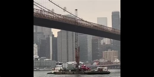 WATCH: Crane on barge hits the Brooklyn Bridge