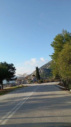 The air up here is thick with the scent of pine and wild herbs. Our drive around the mountain villages was a feast for the senses, navigating endless serpentine roads that cut through the green interior of Samos. It’s less about reaching a destination and more about soaking in the tranquility and the sheer scale of the landscape. #MountainSideDrive #WestSamos #PineScentedAir #TranquilDrive | Vilkap