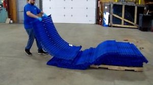 How can this Plastic Conveyor Belting be "repurposed" and given second life? Our employee David showing off the flexibility of this unique product! Let us know what you think this could be "repurposed" for below?👇 | repurposed MATERIALS