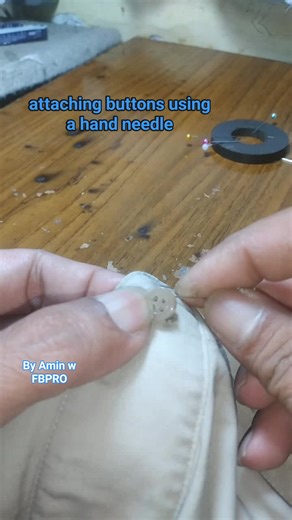 Buttons on clothes often come loose. This time, I'll share a DIY method for attaching buttons. The tools you'll need are thread, a needle, and scissors. I hope this video is helpful. 😊🙏 #Fashion #Style #Trendy #Fashionista #FashionDesign #Sewing #SustainableFashion #EcoFashion #FashionForACause #UpcycledFashion | Amin W