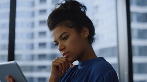 Woman typing on digital tablet | Free Stock Video Footage