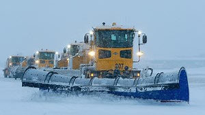 Clearing Mitchell's runways a choreographed snow dance powered by massive diesel engines