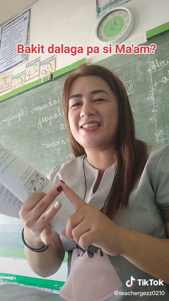 Reading Educational Booklet in Classroom Setting