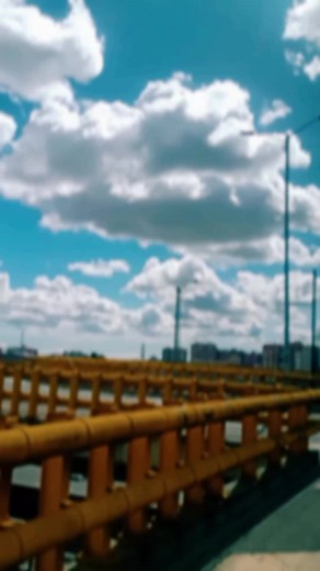 Stunning Cityscape Views of a Yellow Bridge